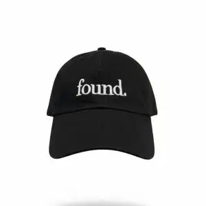 found black dad hat front view with embroidered “found.” logo